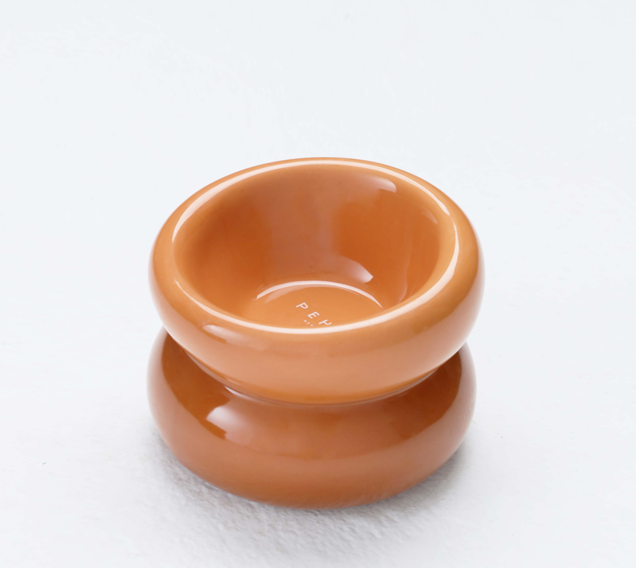 Side profile of 13cm elevated orange ceramic dog bowl for neck protection
