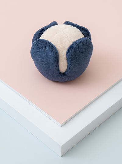 Front view of PEHOM Anemone plush dog toy with colorful flower petals