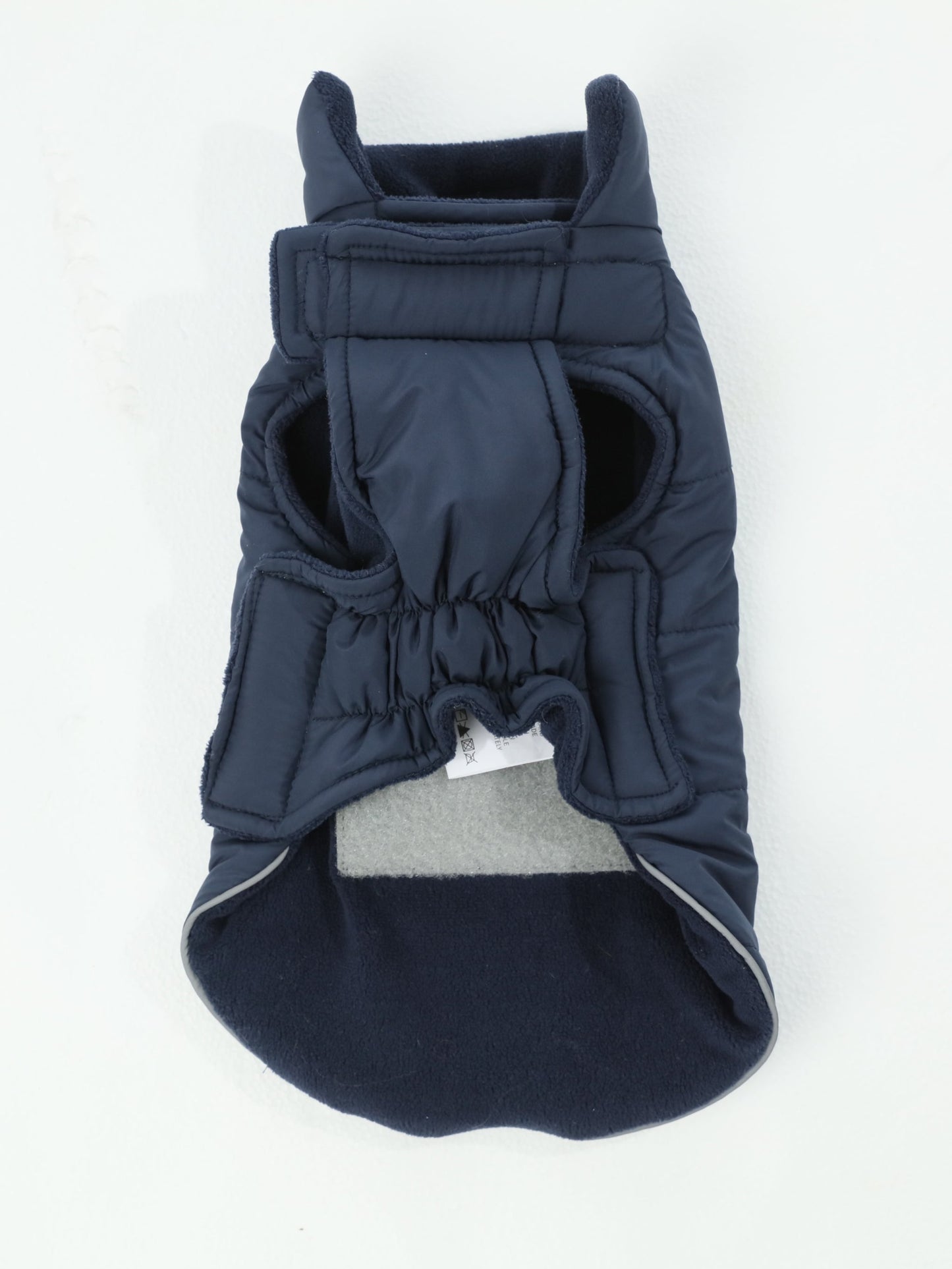 Detail showing the reversible feature with soft cozy fleece lining on the other side