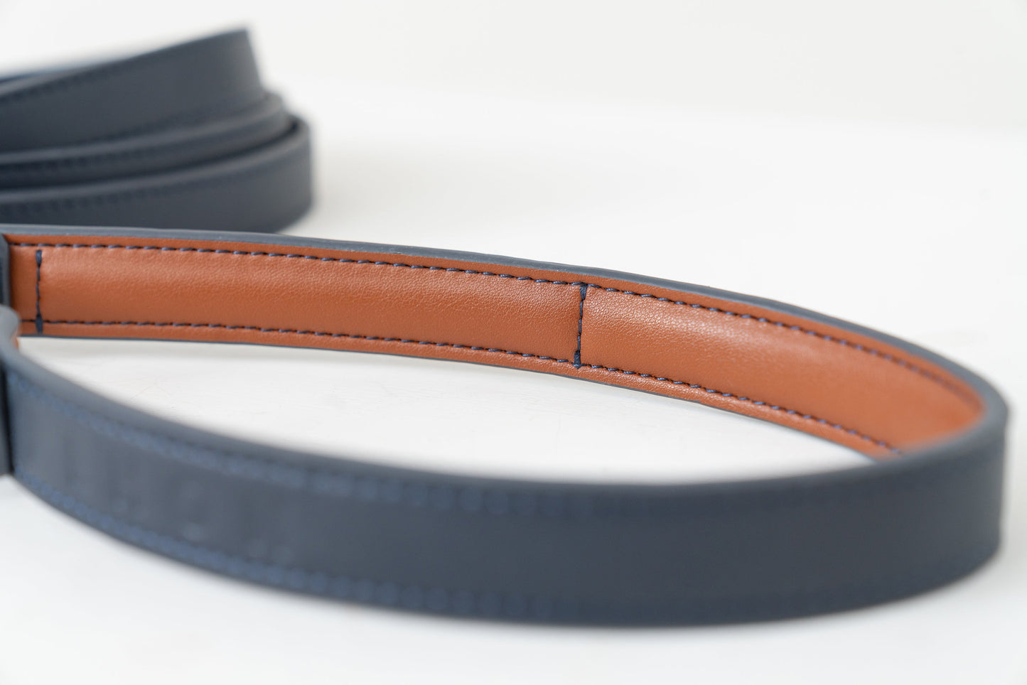 Close up of waterproof PVC coated fabric in navy blue that cleans easily